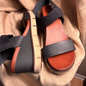 MIA Women's Black and Tan Wedge Sandals